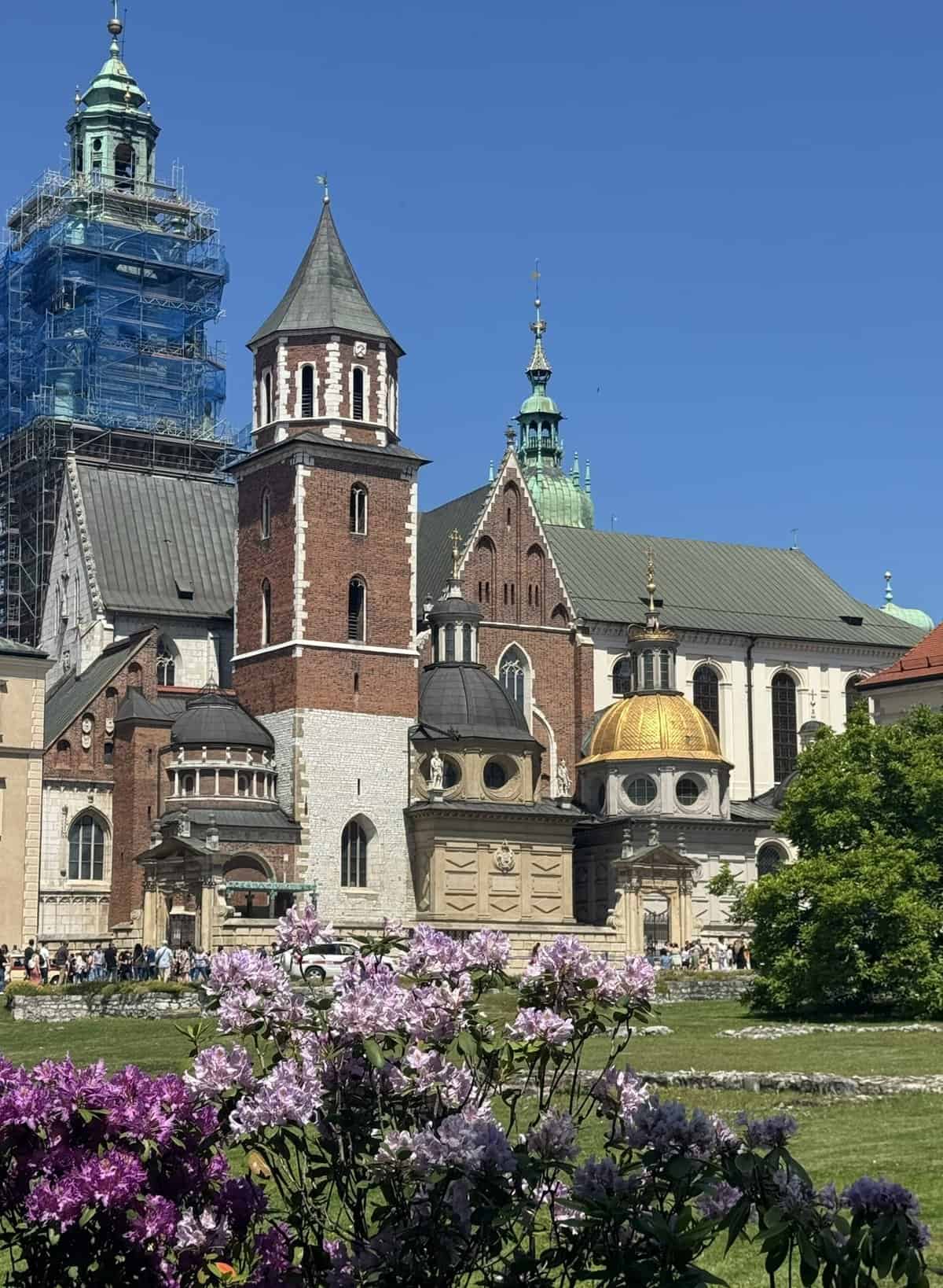 Wawel Castle in Krakow with its majestic towers under a clear sky.